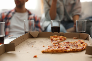 Photo of Tasty fresh pizza on table indoors, closeup
