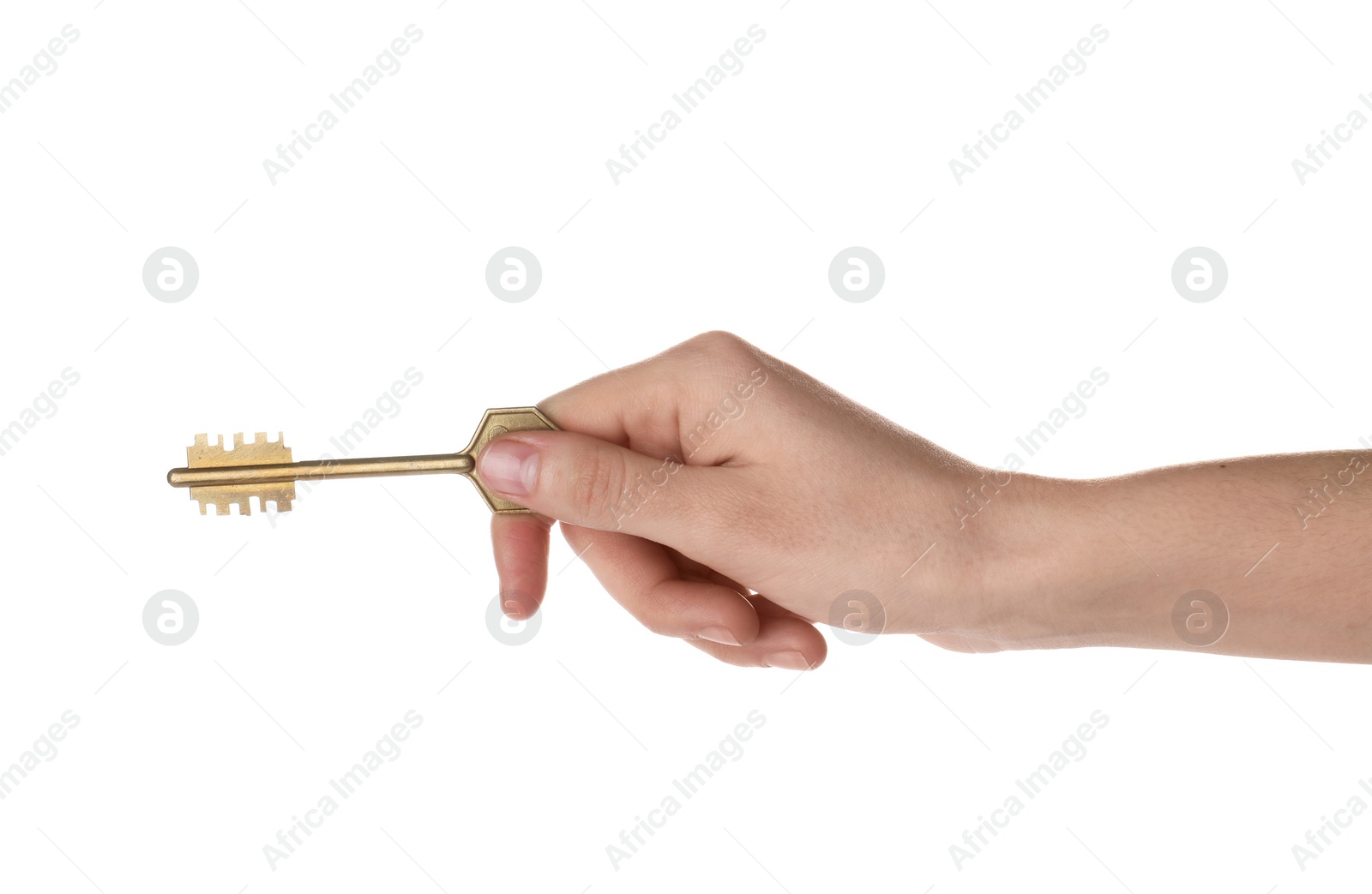 Photo of Woman holding bronze vintage ornate key on white background, closeup