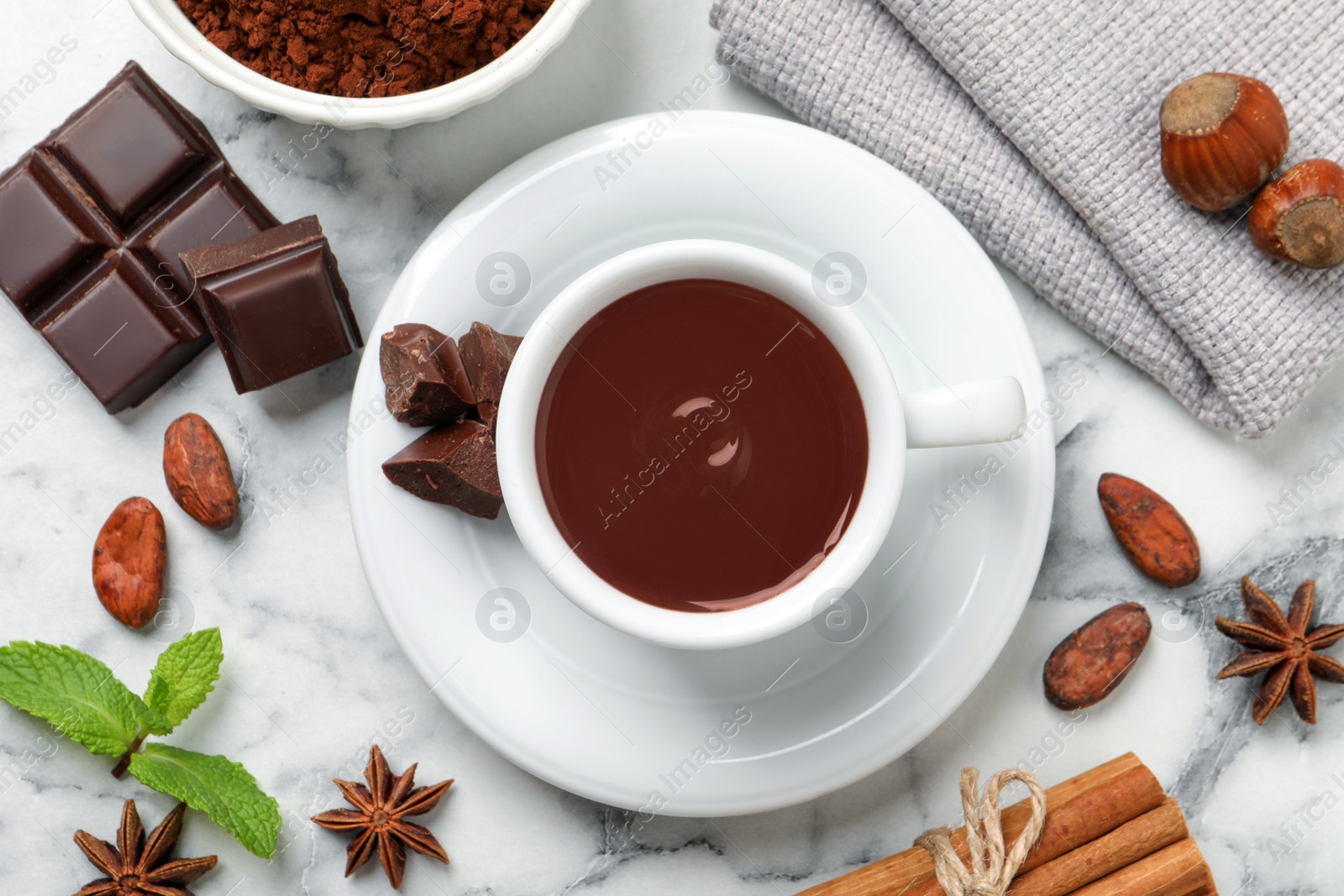 Photo of Flat lay composition with yummy hot chocolate on white marble table