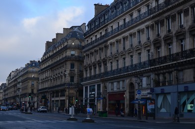 Paris, France - December 10, 2022: City street with beautiful architecture and road