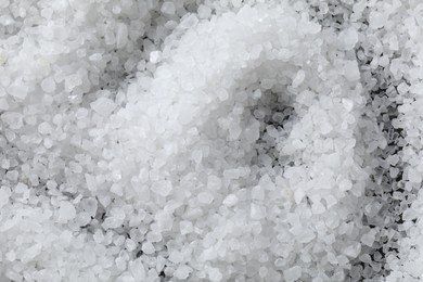 Photo of White natural salt as background, top view