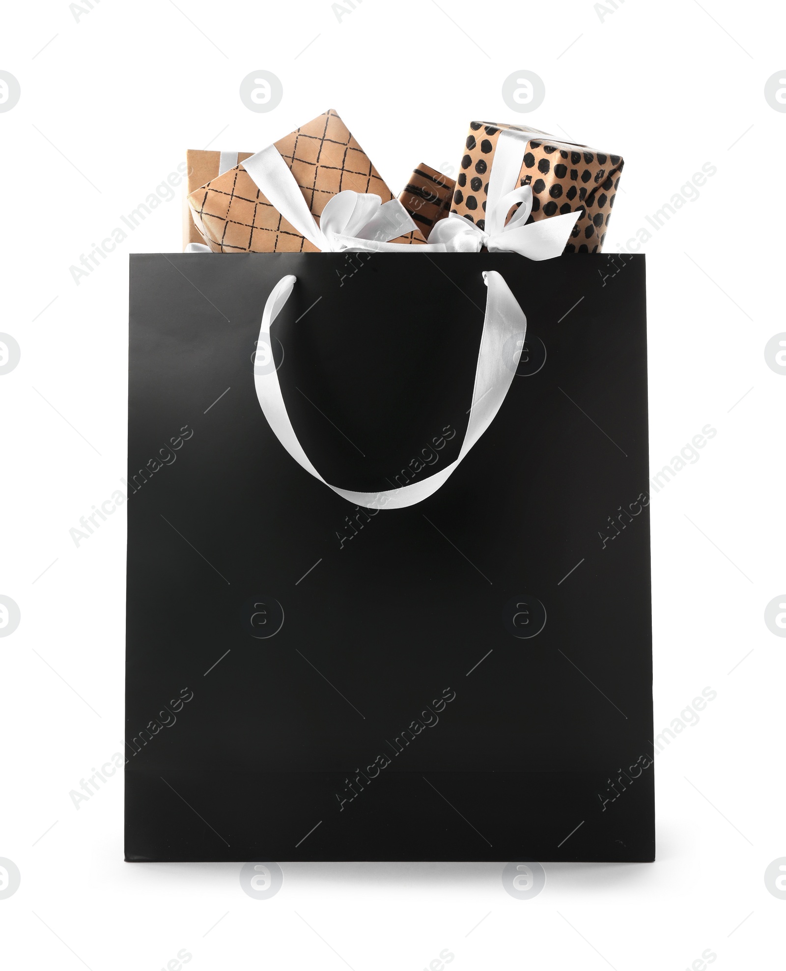 Photo of Paper shopping bag with handles full of gift boxes on white background. Mock up for design