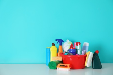 Set of cleaning supplies on table indoors