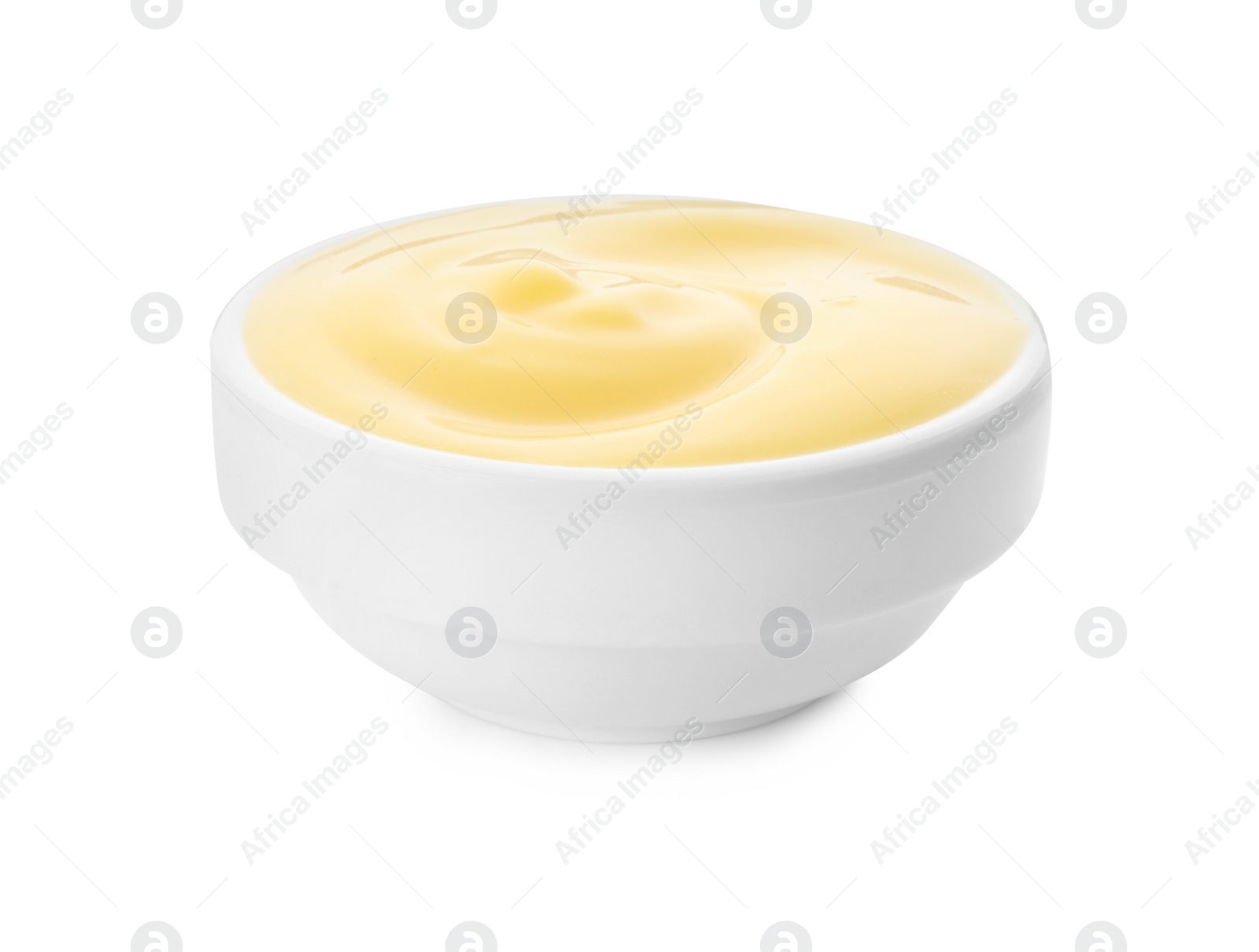 Photo of Delicious cheese sauce in bowl isolated on white