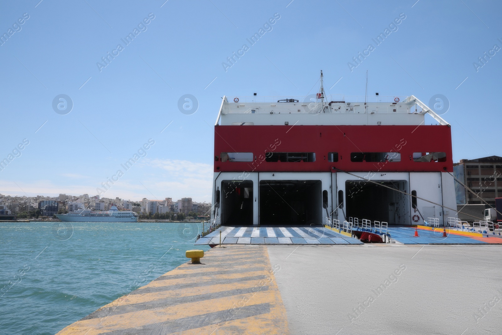 Photo of Modern ferry in sea port on sunny day