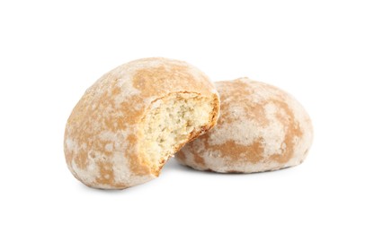 Photo of Tasty bitten and whole gingerbread cookies on white background