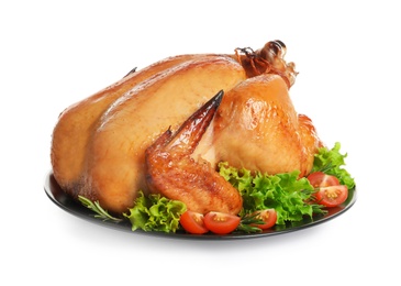 Photo of Platter of cooked turkey with garnish on white background