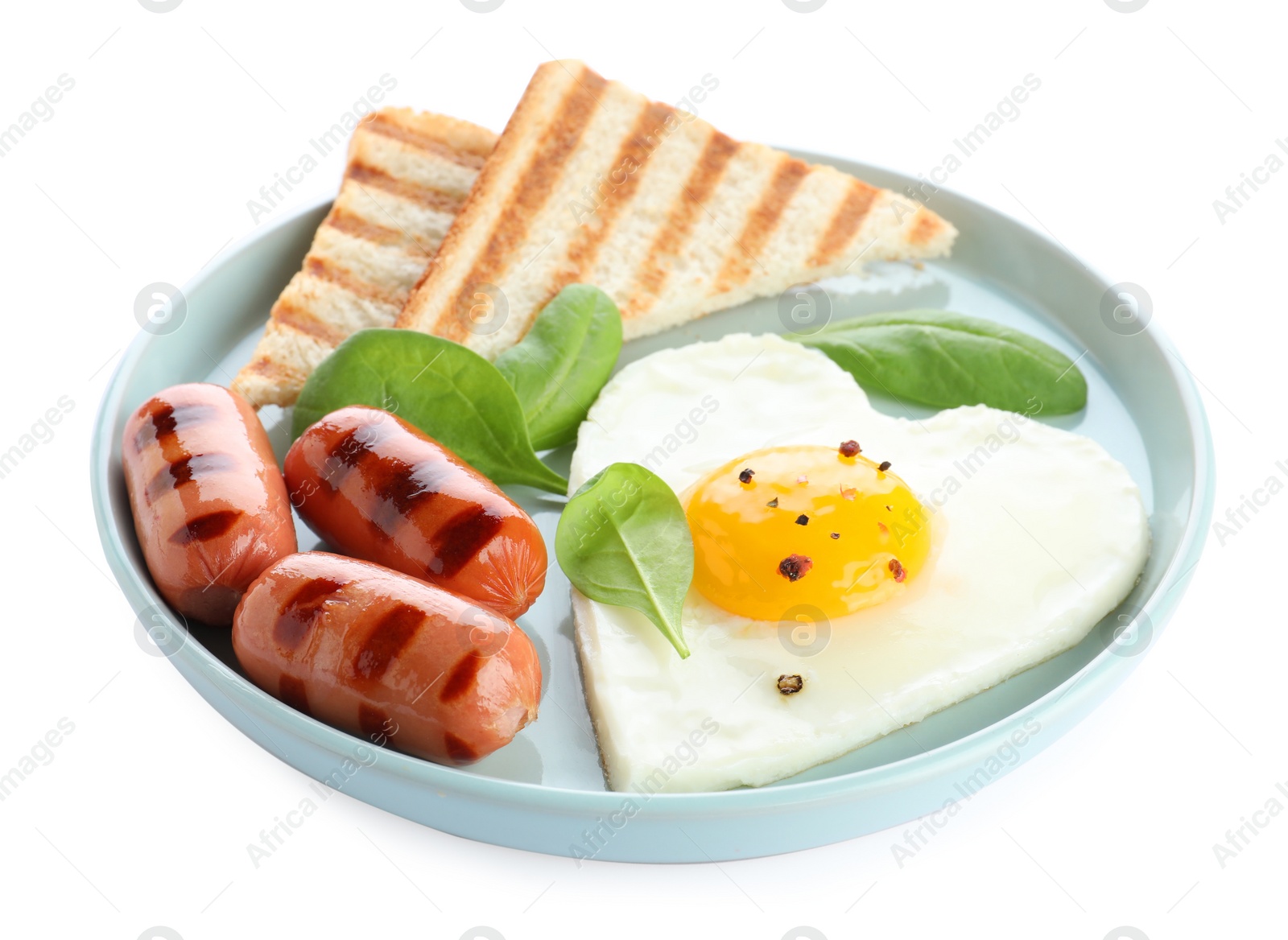 Photo of Plate of tasty breakfast with heart shaped fried egg isolated on white