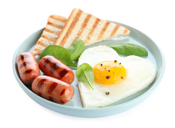 Photo of Plate of tasty breakfast with heart shaped fried egg isolated on white