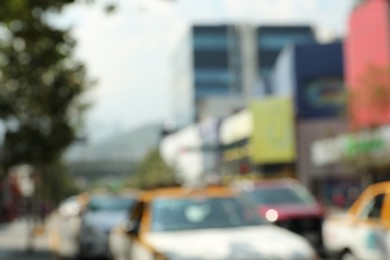 Blurred view of city street with cars