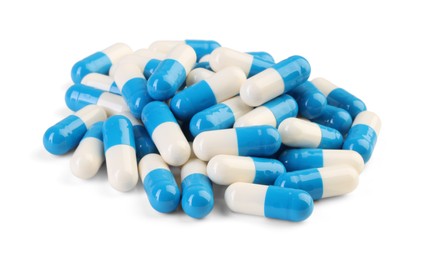 Pile of antibiotic pills isolated on white