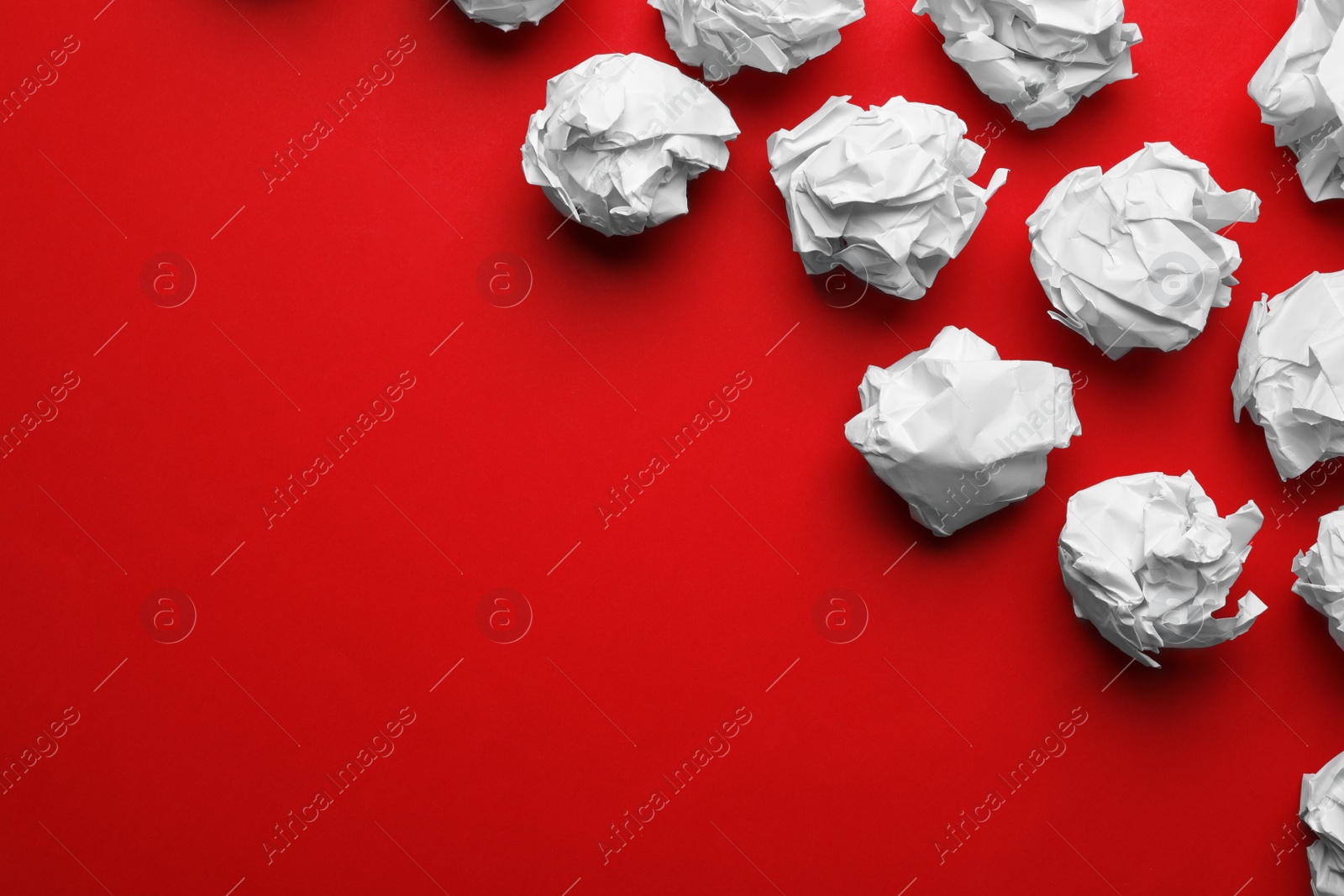 Photo of Paper balls on color background, flat lay. Space for text