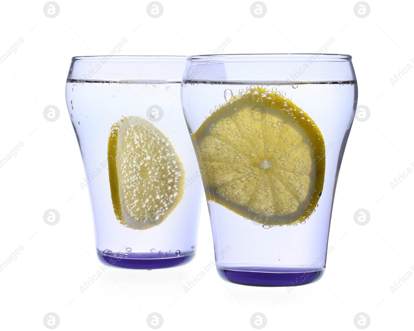 Photo of Refreshing water with lemon slices on white background