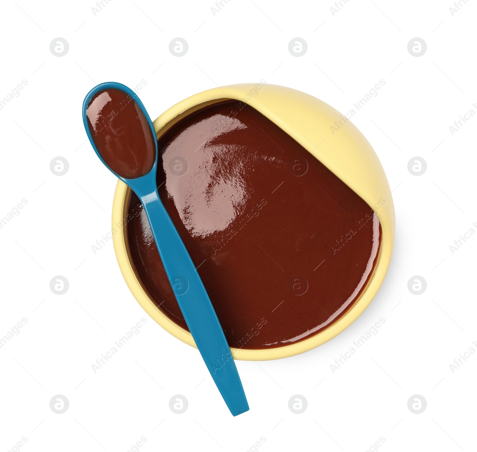 Photo of Delicious baby food in bowl and spoon isolated on white, top view