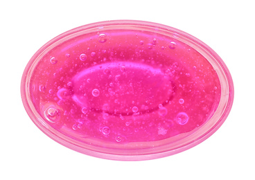 Photo of Magenta slime in plastic container isolated on white, top view. Antistress toy