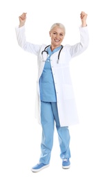 Full length portrait of happy female doctor isolated on white. Medical staff