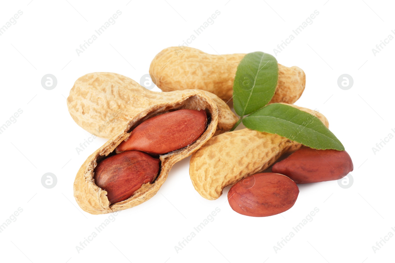 Photo of Fresh peanuts and green leaves isolated on white