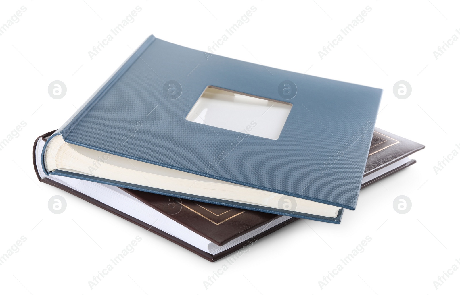 Photo of Two closed photo albums isolated on white