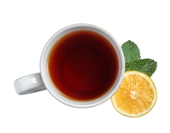 Cup of tea, mint and lemon on white background, top view