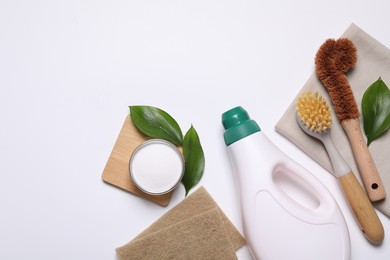 Flat lay composition with different cleaning supplies on white background