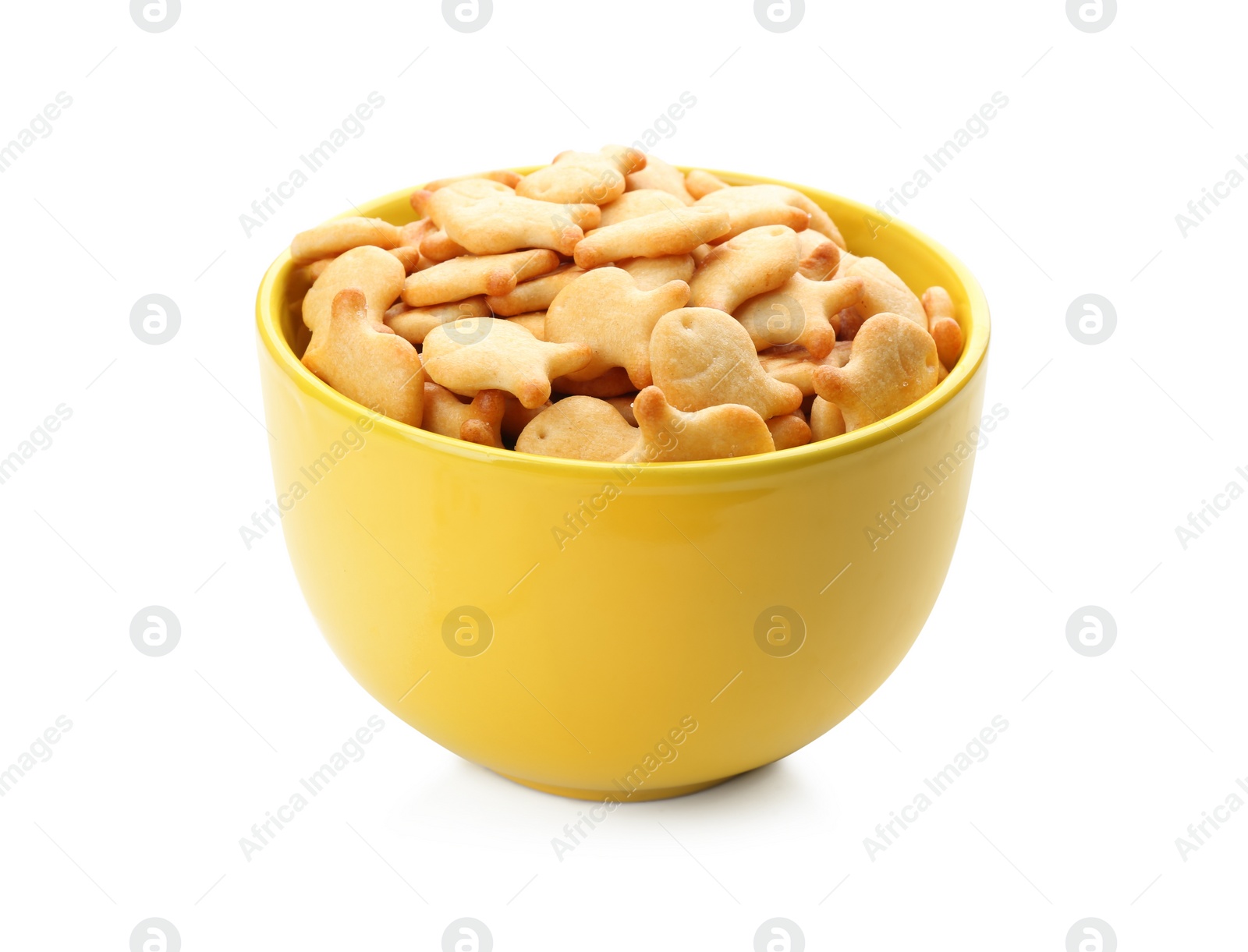 Photo of Delicious goldfish crackers in bowl isolated on white