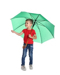 Photo of Little boy with green umbrella on white background