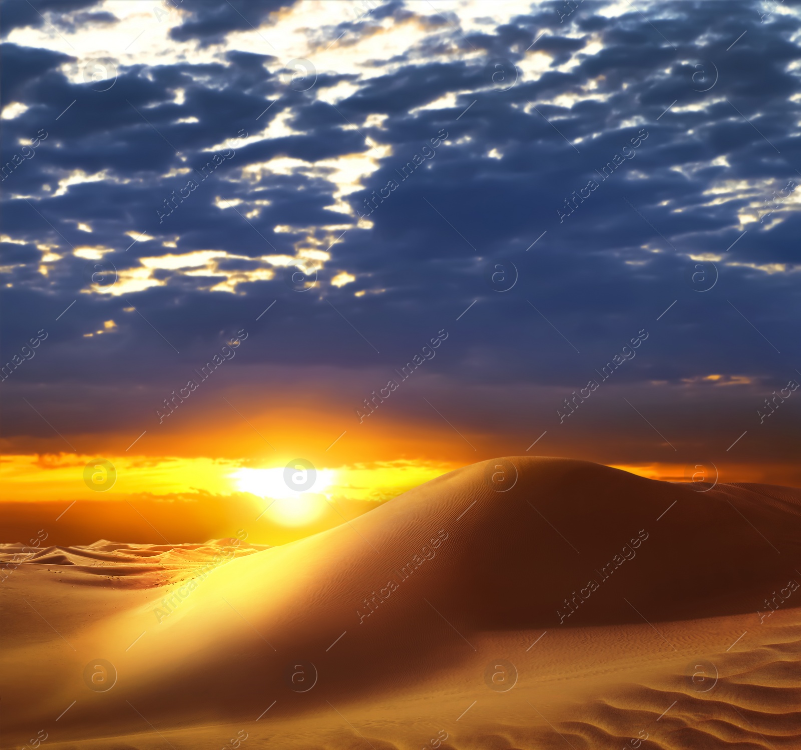 Image of Beautiful view of sandy desert at sunset