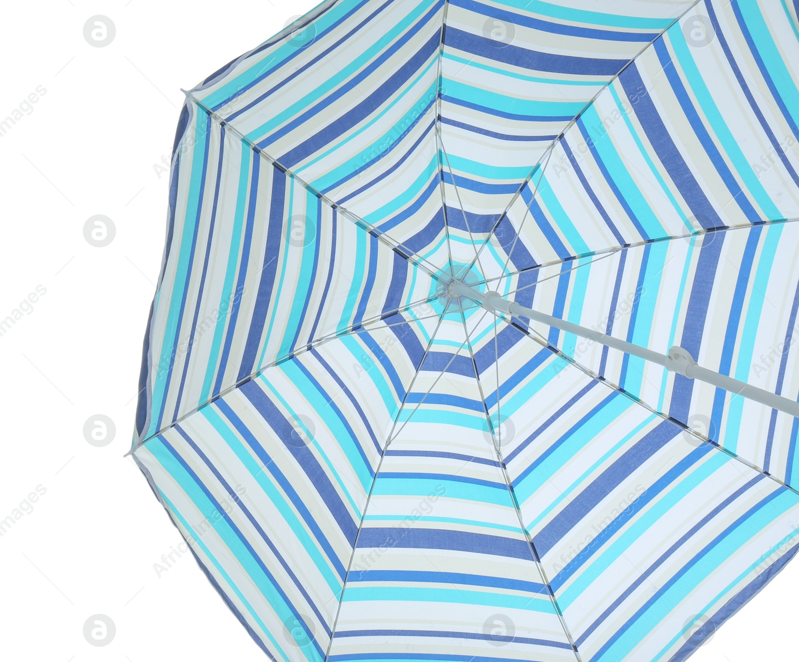 Photo of Open blue striped beach umbrella isolated on white. Inner side