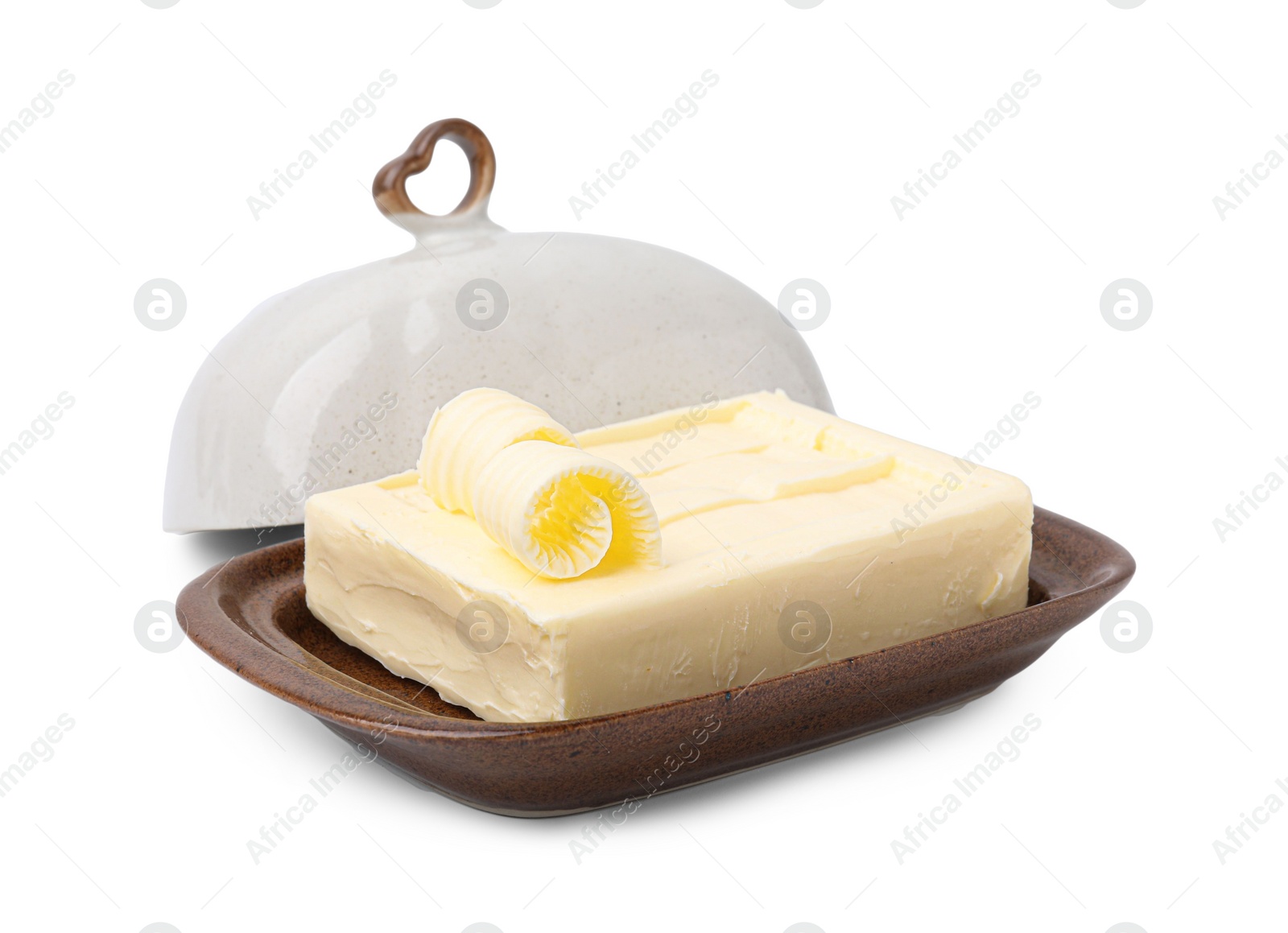 Photo of Tasty butter and curls in dish isolated on white
