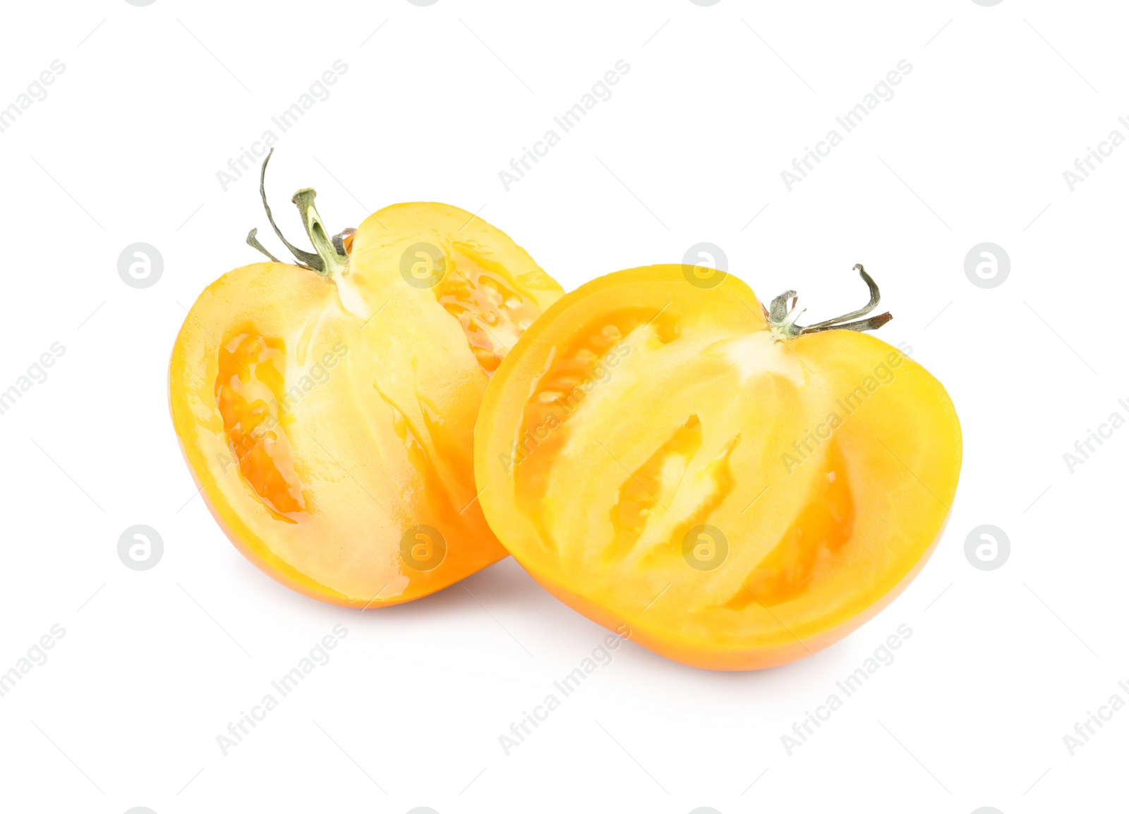 Photo of Cut ripe yellow tomato on white background