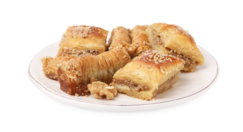 Photo of Eastern sweets. Pieces of tasty baklava isolated on white