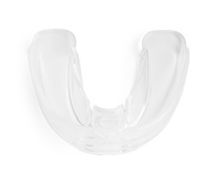 Photo of Transparent dental mouth guard isolated on white, top view. Bite correction