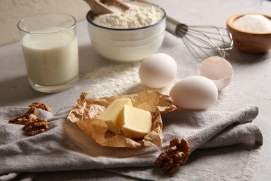 Photo of Different ingredients for dough on table, closeup