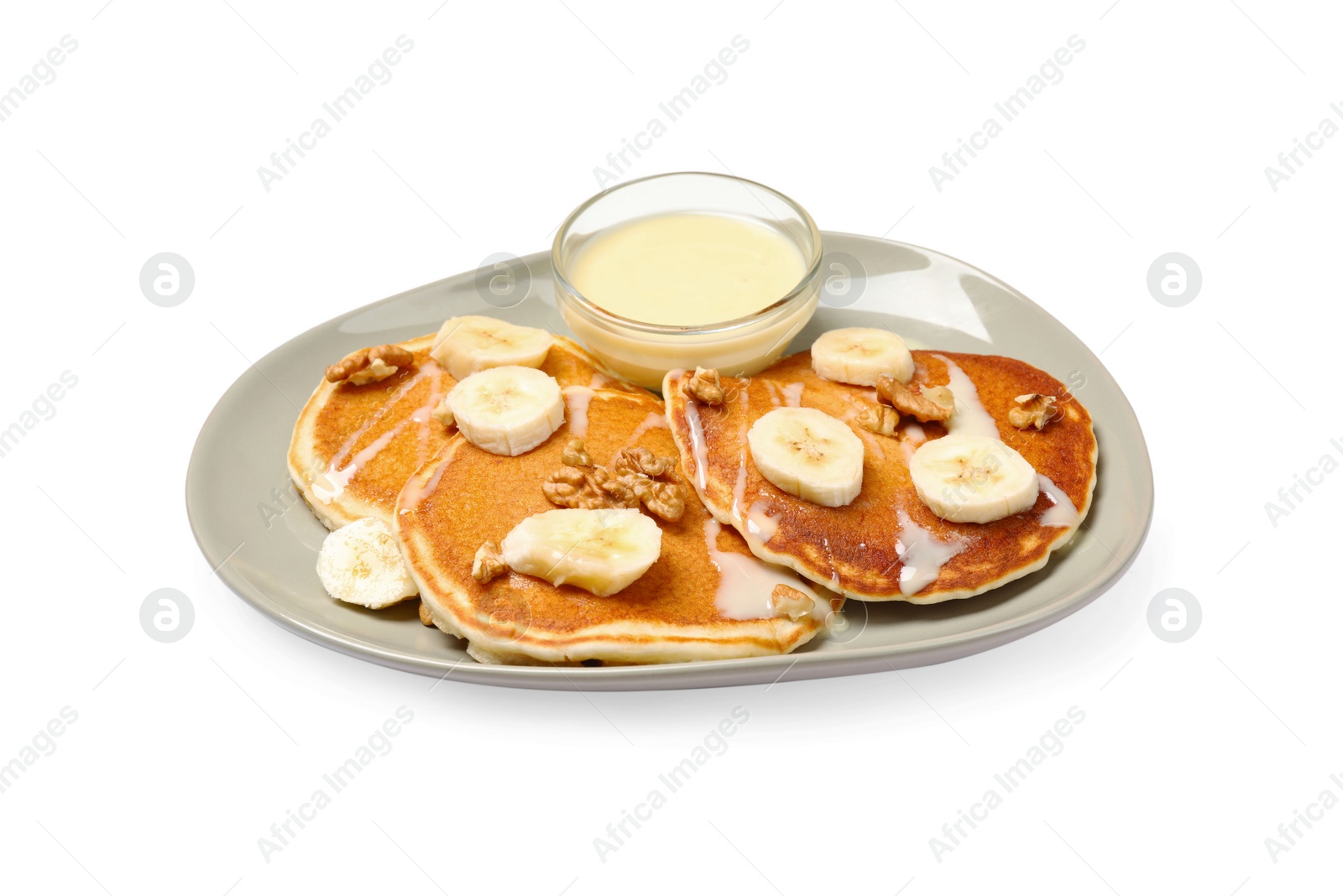 Photo of Tasty pancakes with sliced banana isolated on white