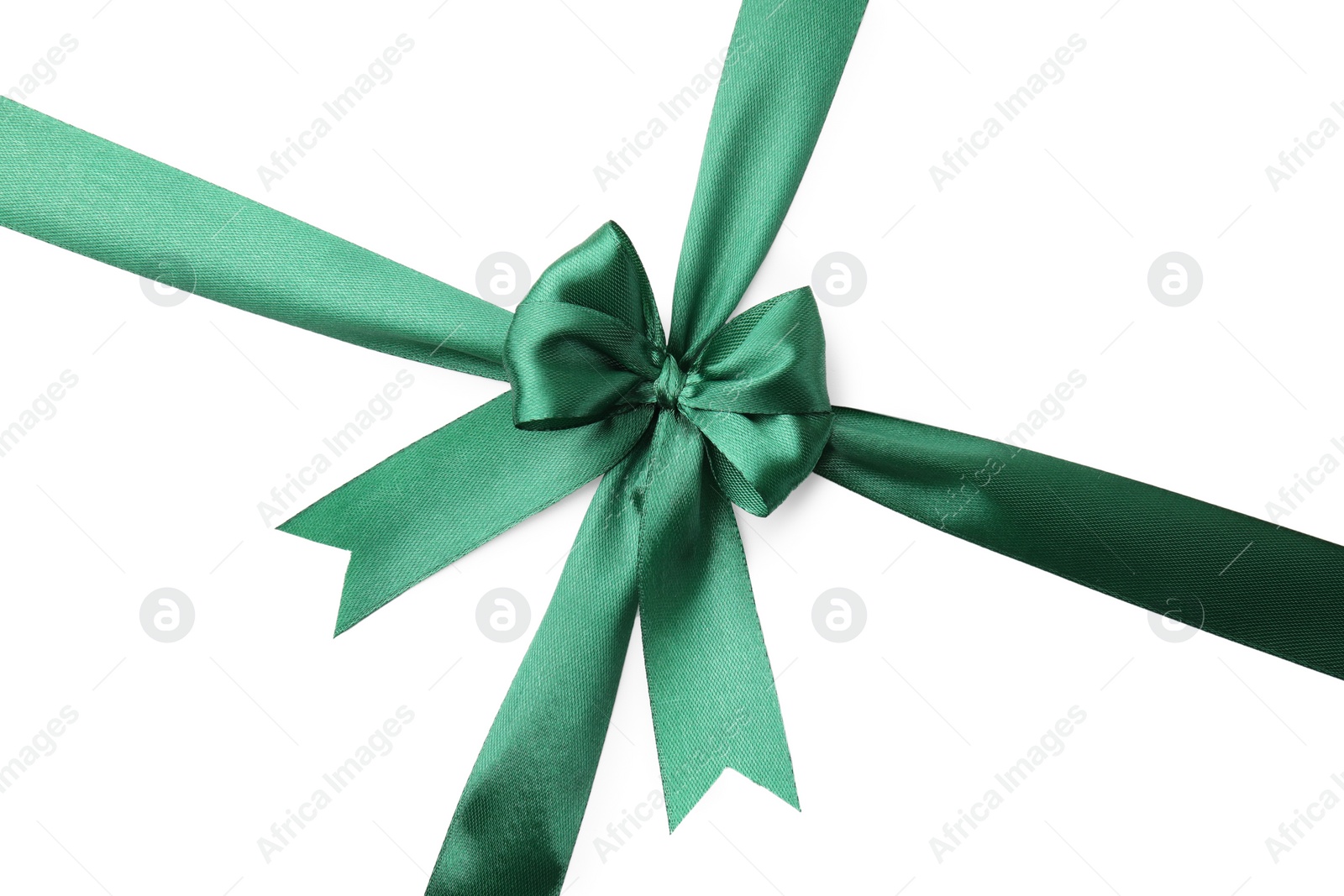 Photo of Green satin ribbon with bow isolated on white, top view