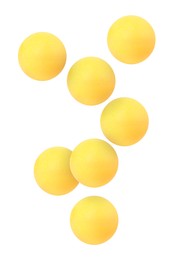 Image of Many table tennis balls flying on white background