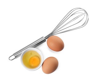 Photo of Whisk, whole and broken eggs isolated on white, top view