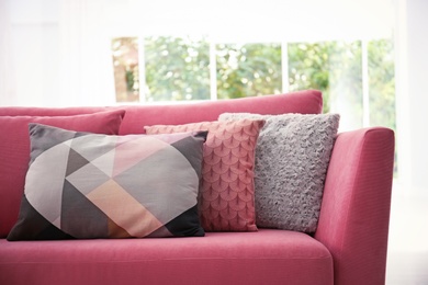 Sofa with colorful pillows in living room