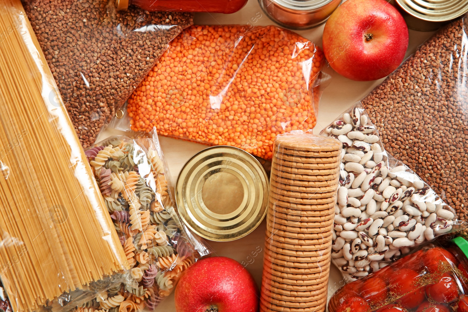 Photo of Many different products on table, top view. Food donation