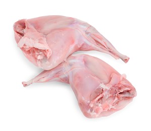 Photo of Fresh raw rabbit legs isolated on white, top view
