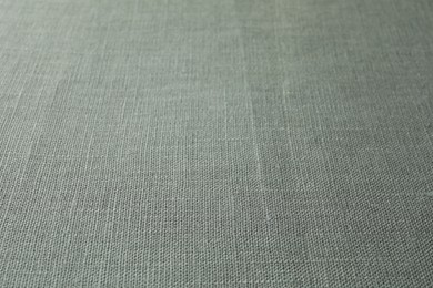 Photo of Texture of grey fabric as background, closeup