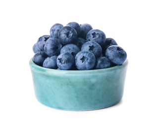 Photo of Tasty fresh ripe blueberries in bowl on white background