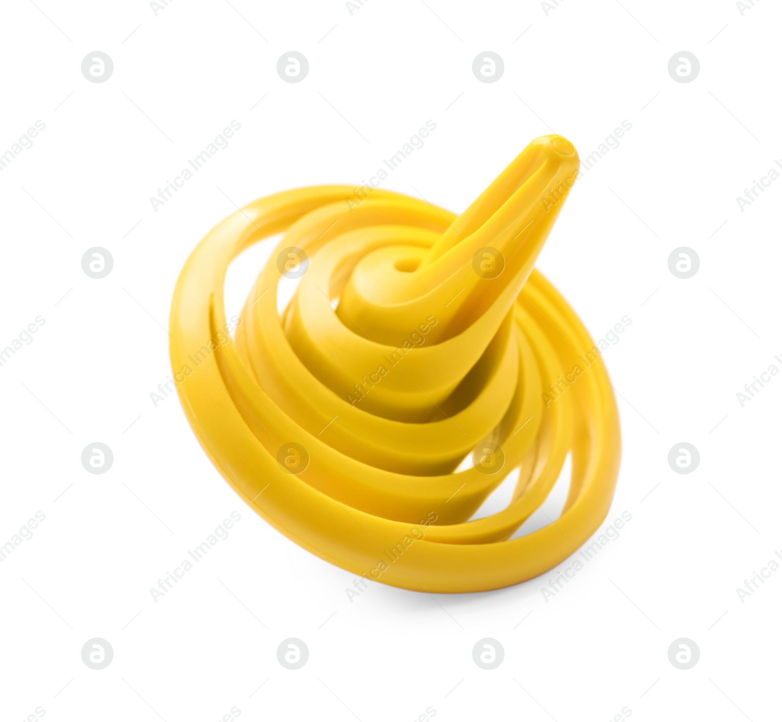 Photo of One yellow spinning top on white background