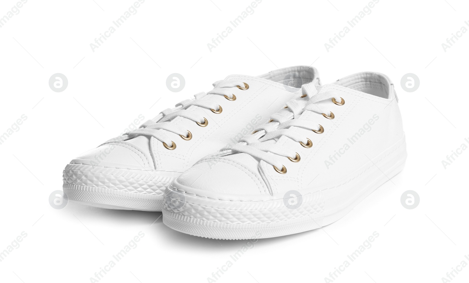 Photo of Pair of stylish sneakers on white background