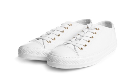 Pair of stylish sneakers on white background