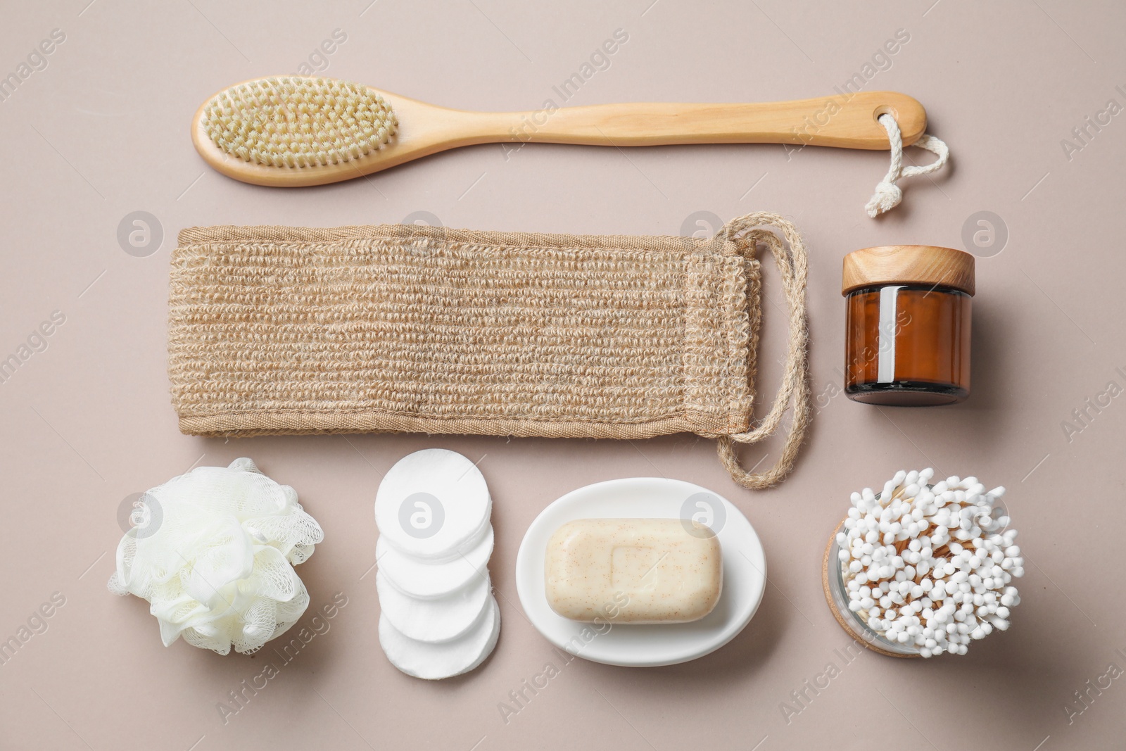 Photo of Bath accessories. Flat lay composition with personal care products on beige background