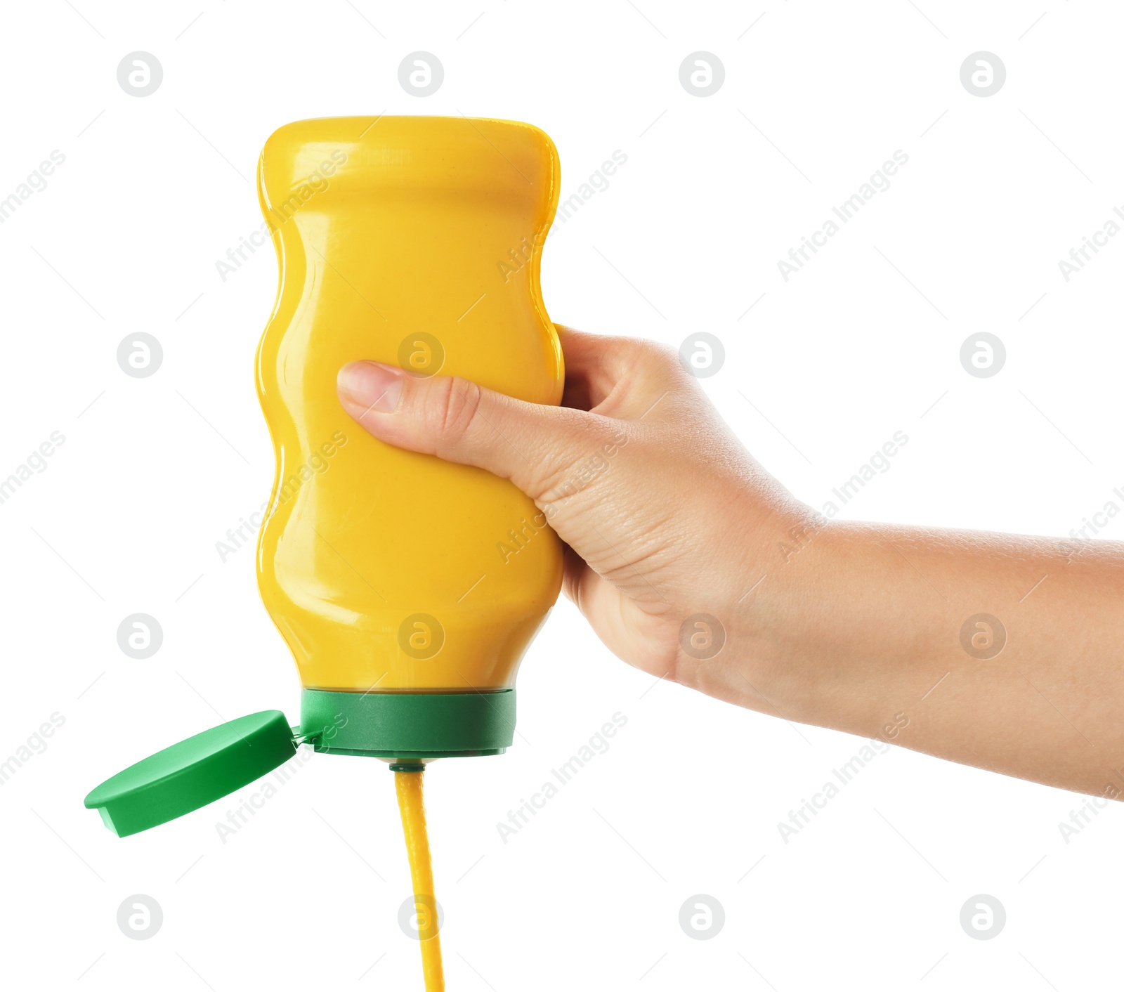 Photo of Woman with bottle of mustard on white background, closeup