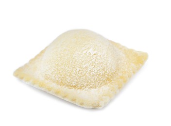 Uncooked ravioli with filling on white background