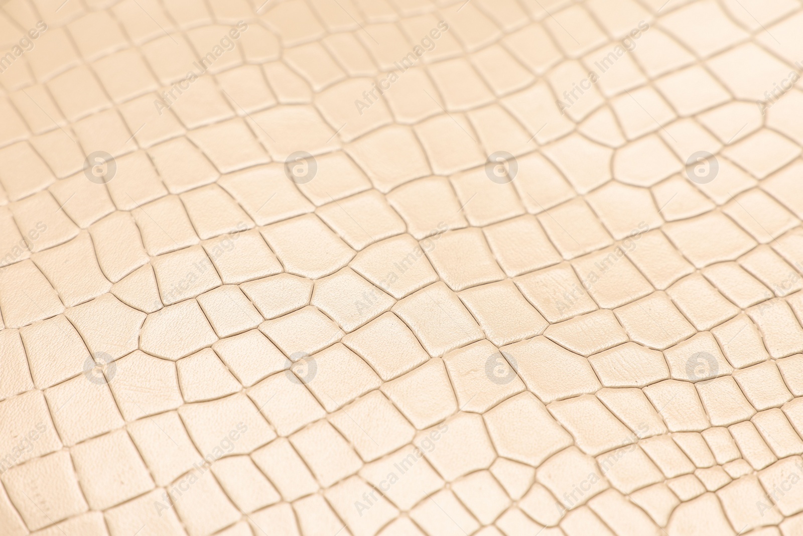 Photo of Beige natural leather as background, closeup view