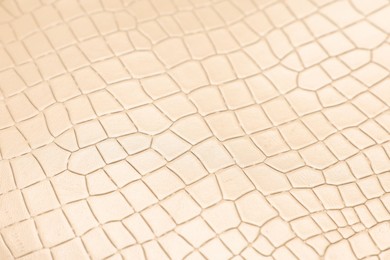 Photo of Beige natural leather as background, closeup view